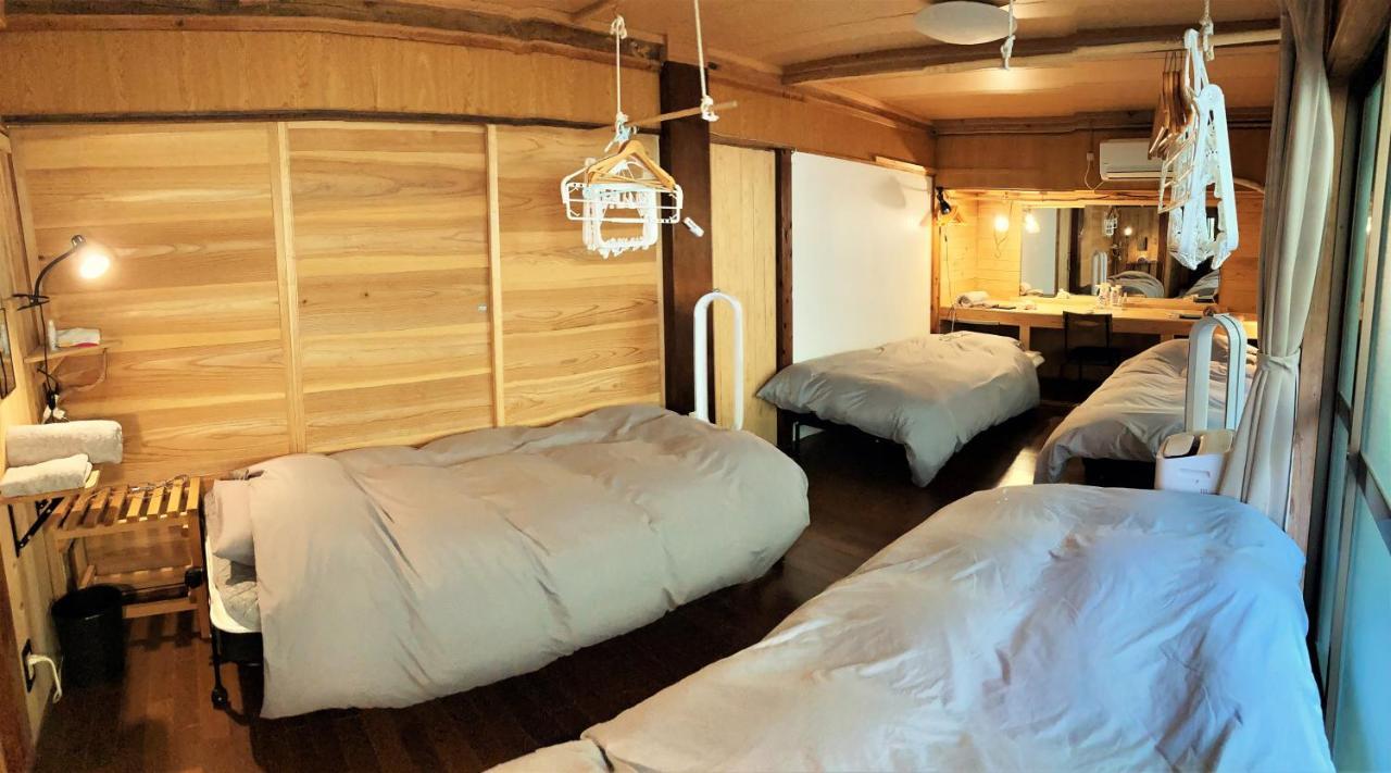 奄美ゲストハウス Hub A Nice Inn Setouchi  Buitenkant foto